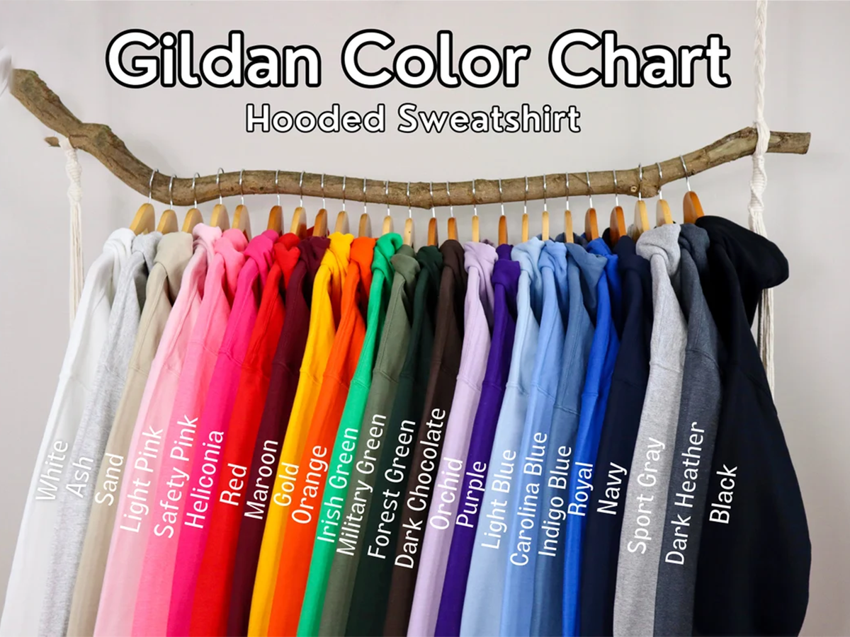 A collection of colorful hooded sweatshirts hanging on a wooden hanger, with a color chart displayed above them.