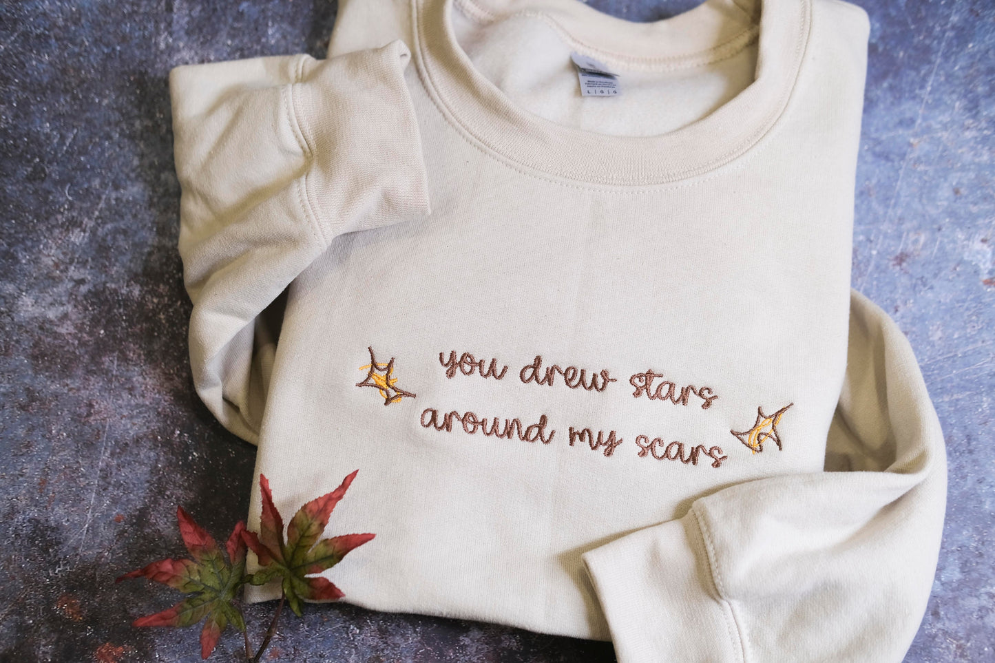 You drew stars around my scars