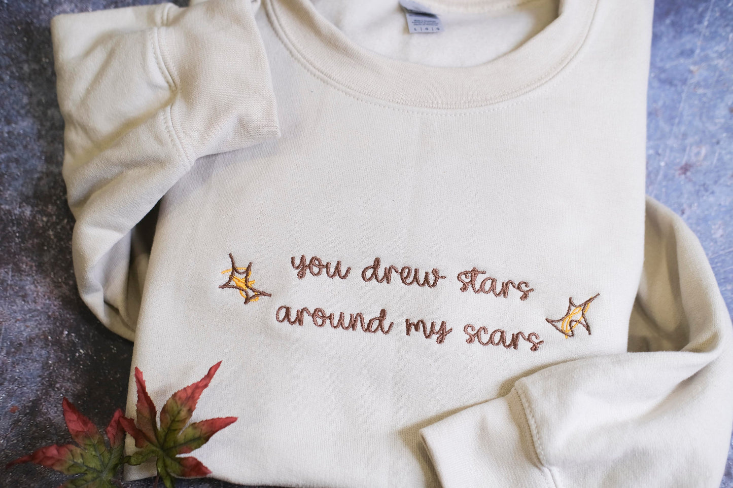 You drew stars around my scars