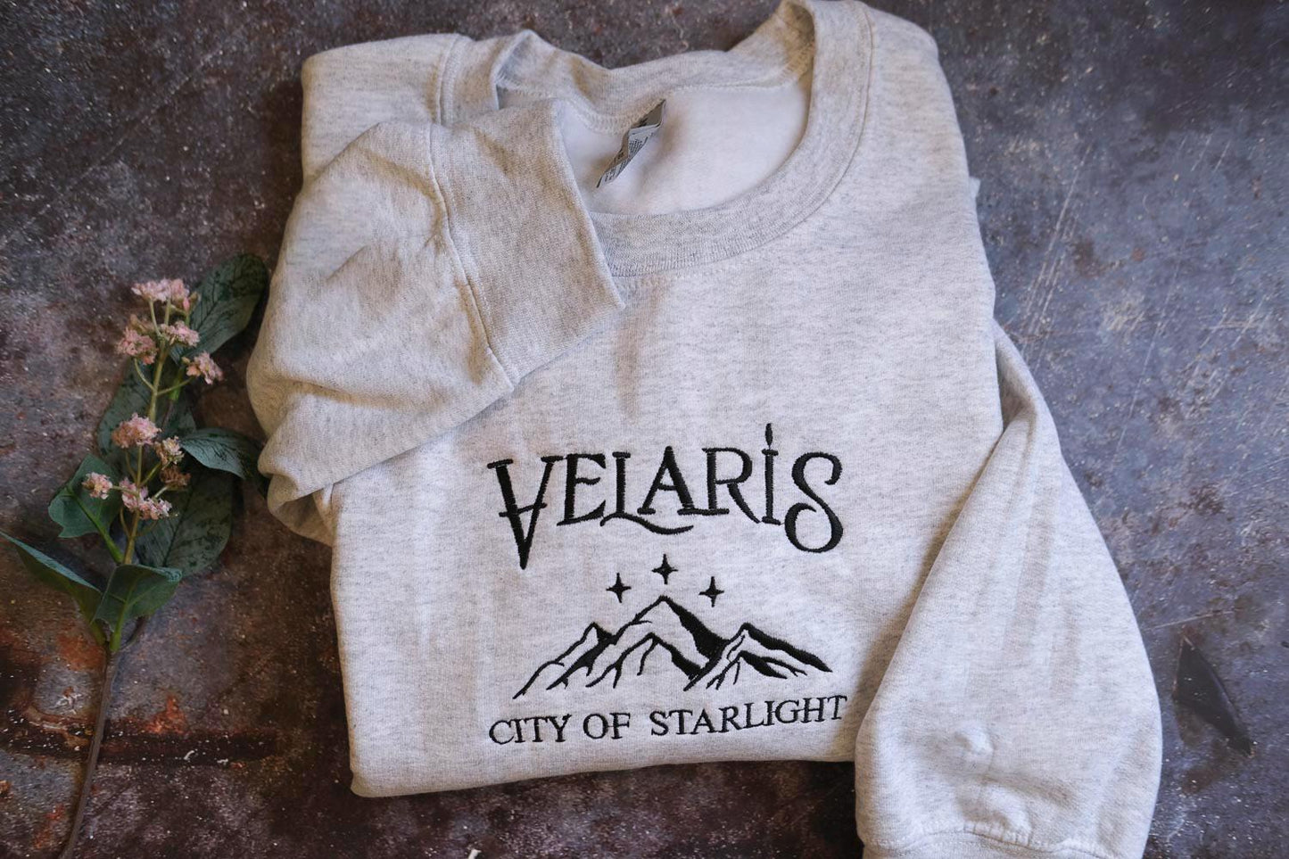 a sweatshirt with the name of the city of starlight on it