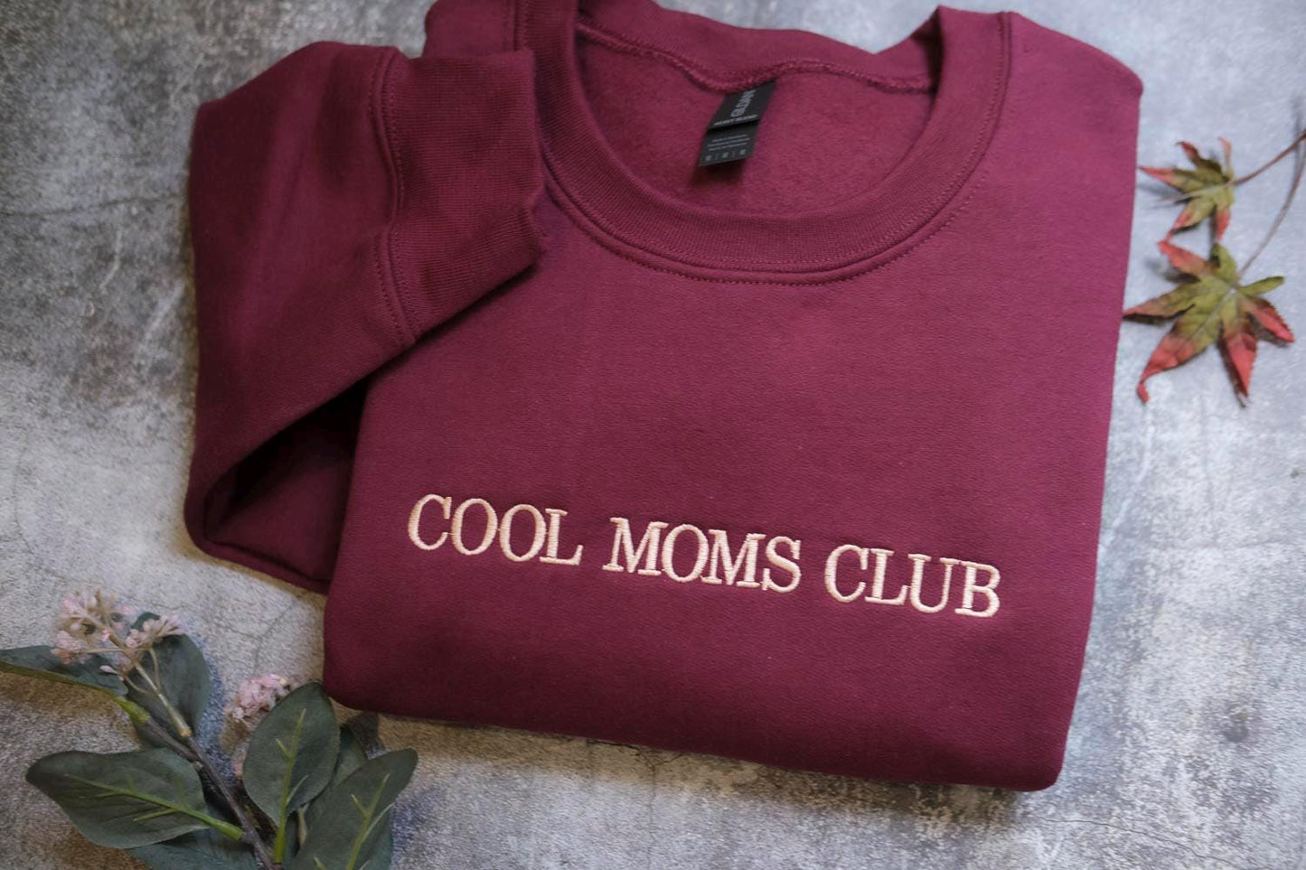 a t - shirt that says cool moms club on it