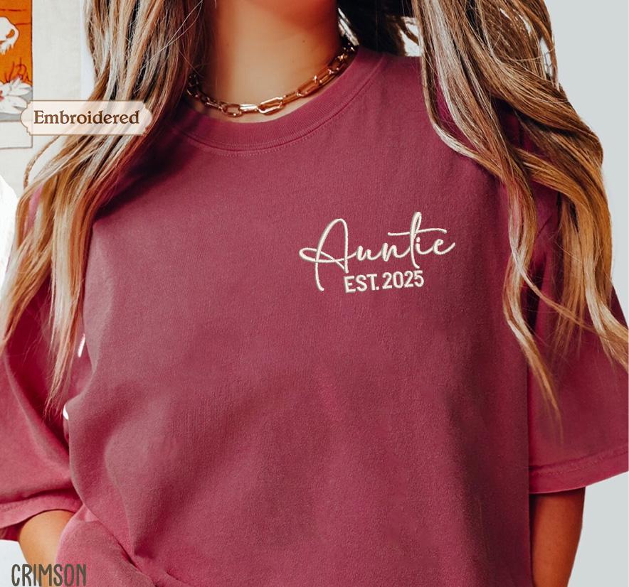 a woman wearing a t - shirt with the name annie est 2055 printed on