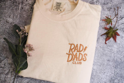 a t - shirt with the words rad dads club on it