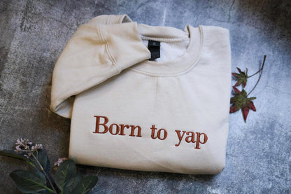 a t - shirt that says born to yap on it