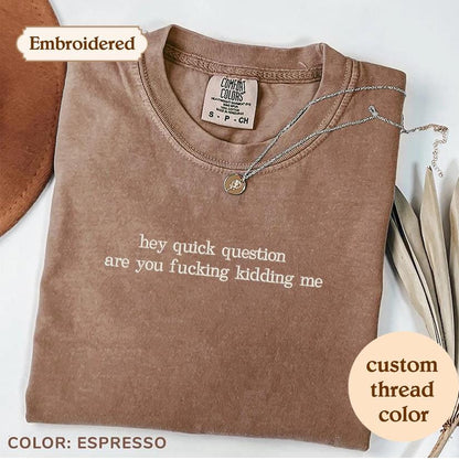 a t - shirt that says, they quick question are you fucking kidling me