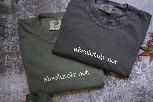 a couple of shirts that are on a table