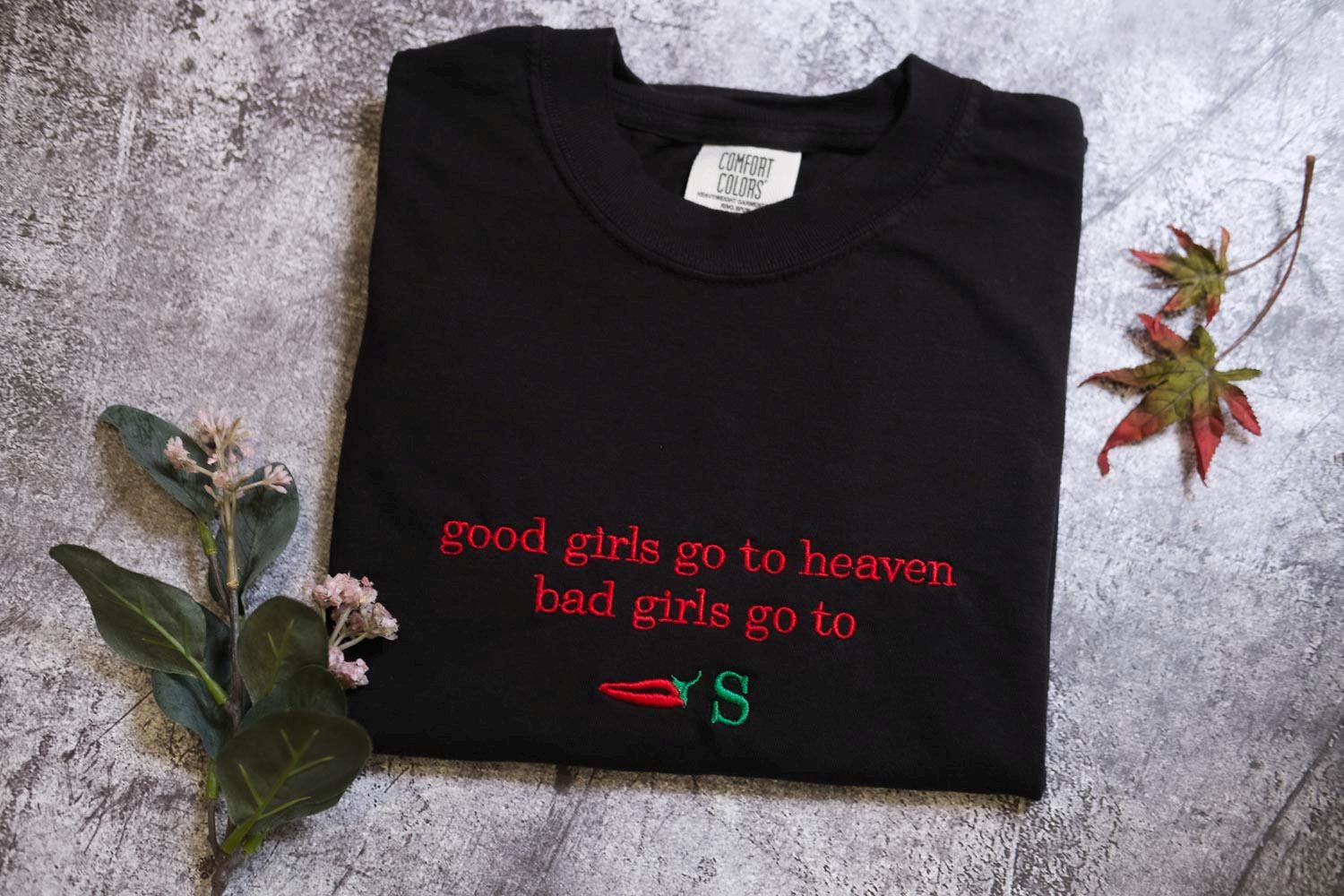 a t - shirt that says good girls go to heaven, bad girls go to