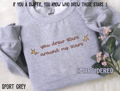 You drew stars  around my scars