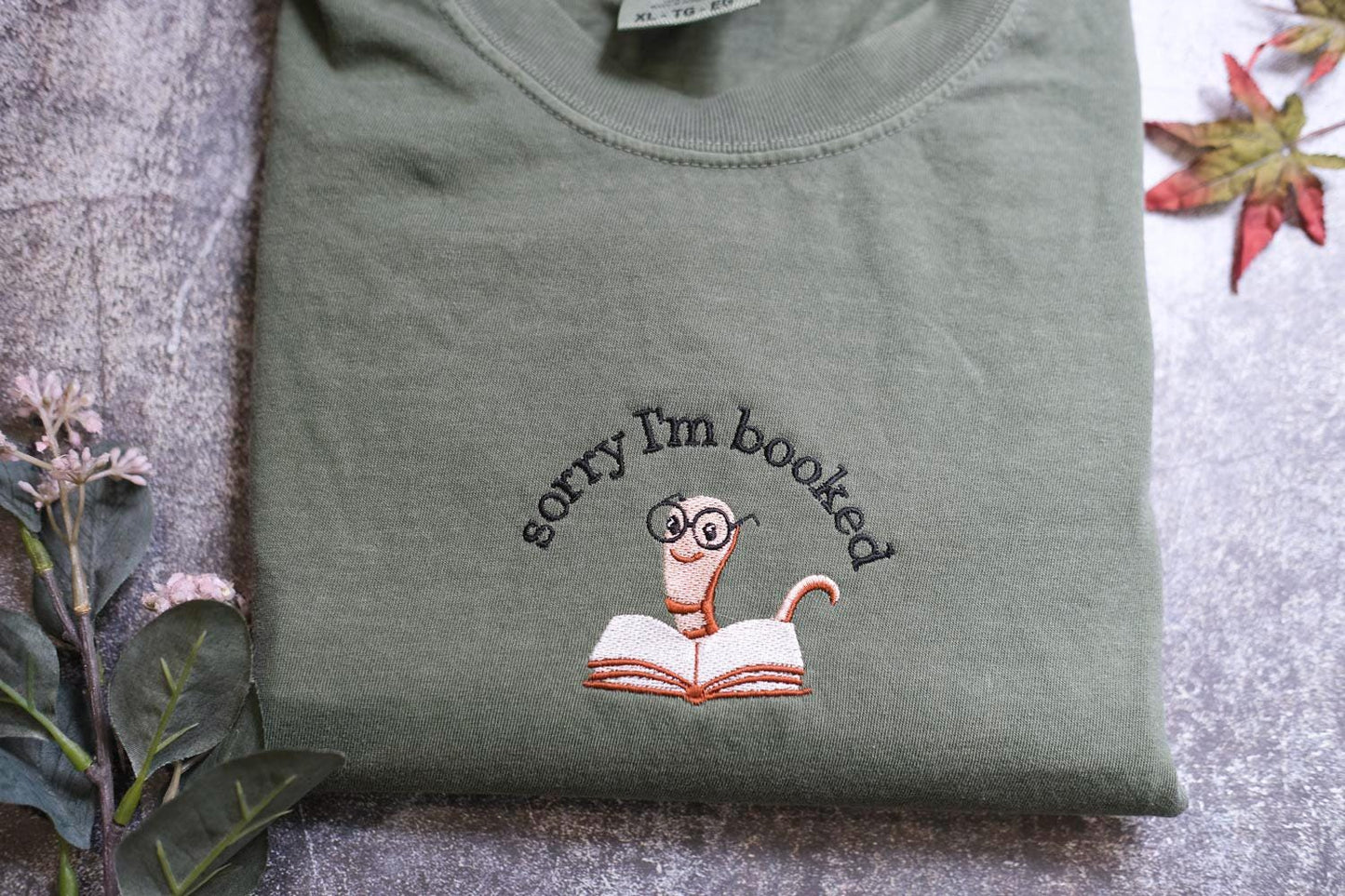 a t - shirt that says sorry i&#39;m books on it