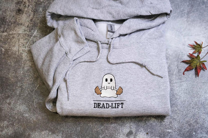 a grey hoodie with a ghost on it
